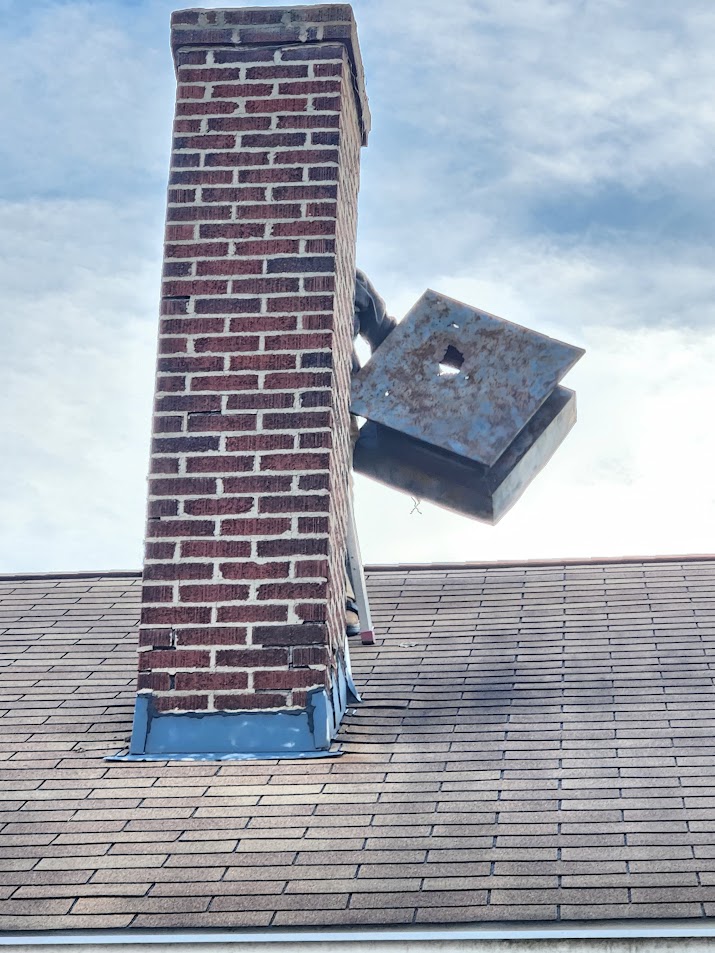 Squirrel damage to chimney cap